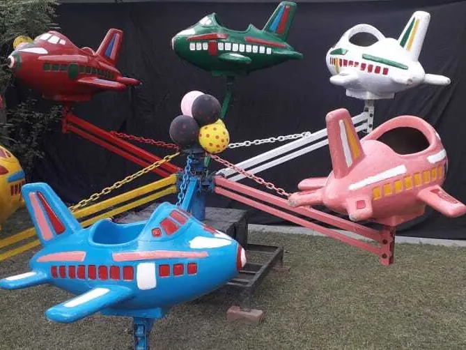 Guests enjoying aeroplane ride during a Noida celebration