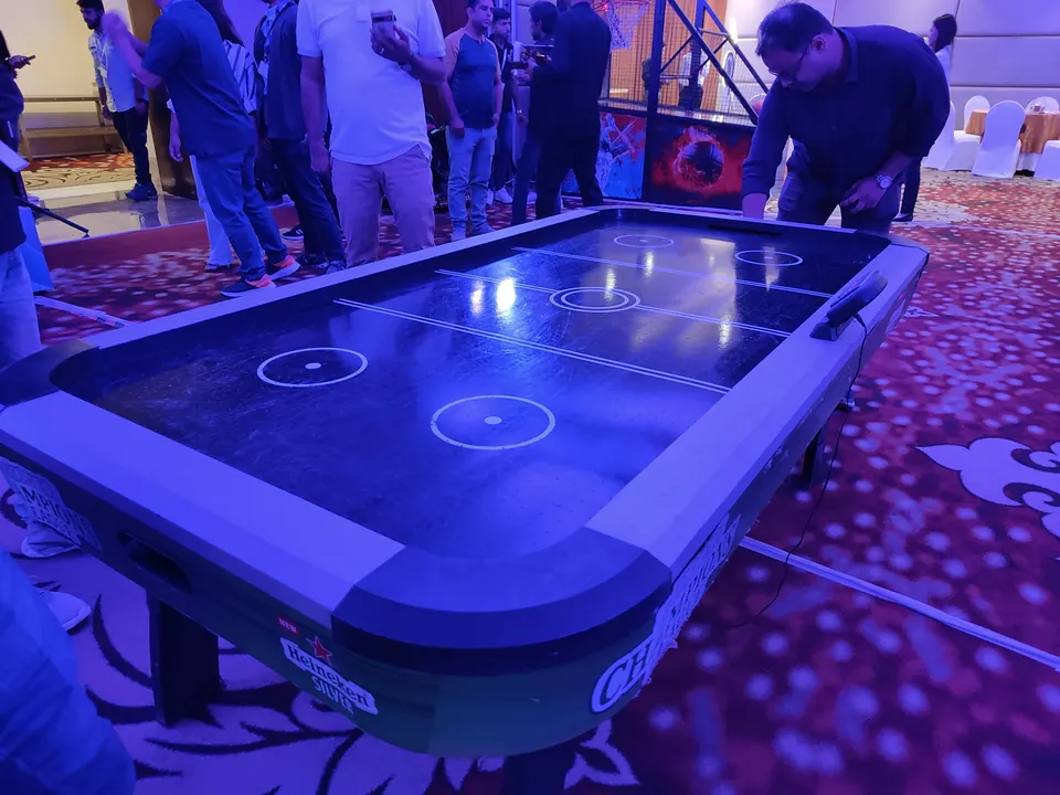 Premium black air hockey table placed at an indoor event in Lucknow