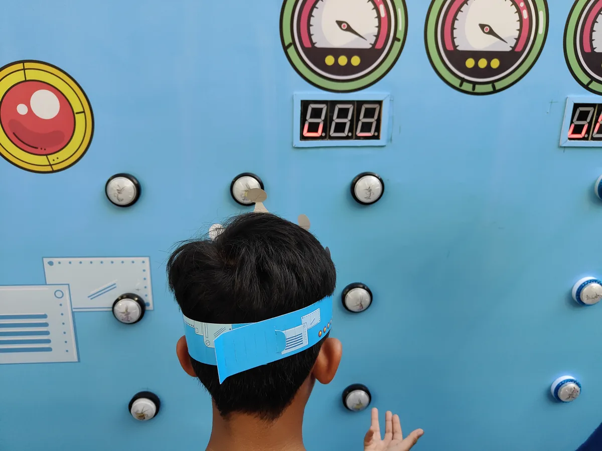 Close view of an illuminated Batak-style reaction target used during an event