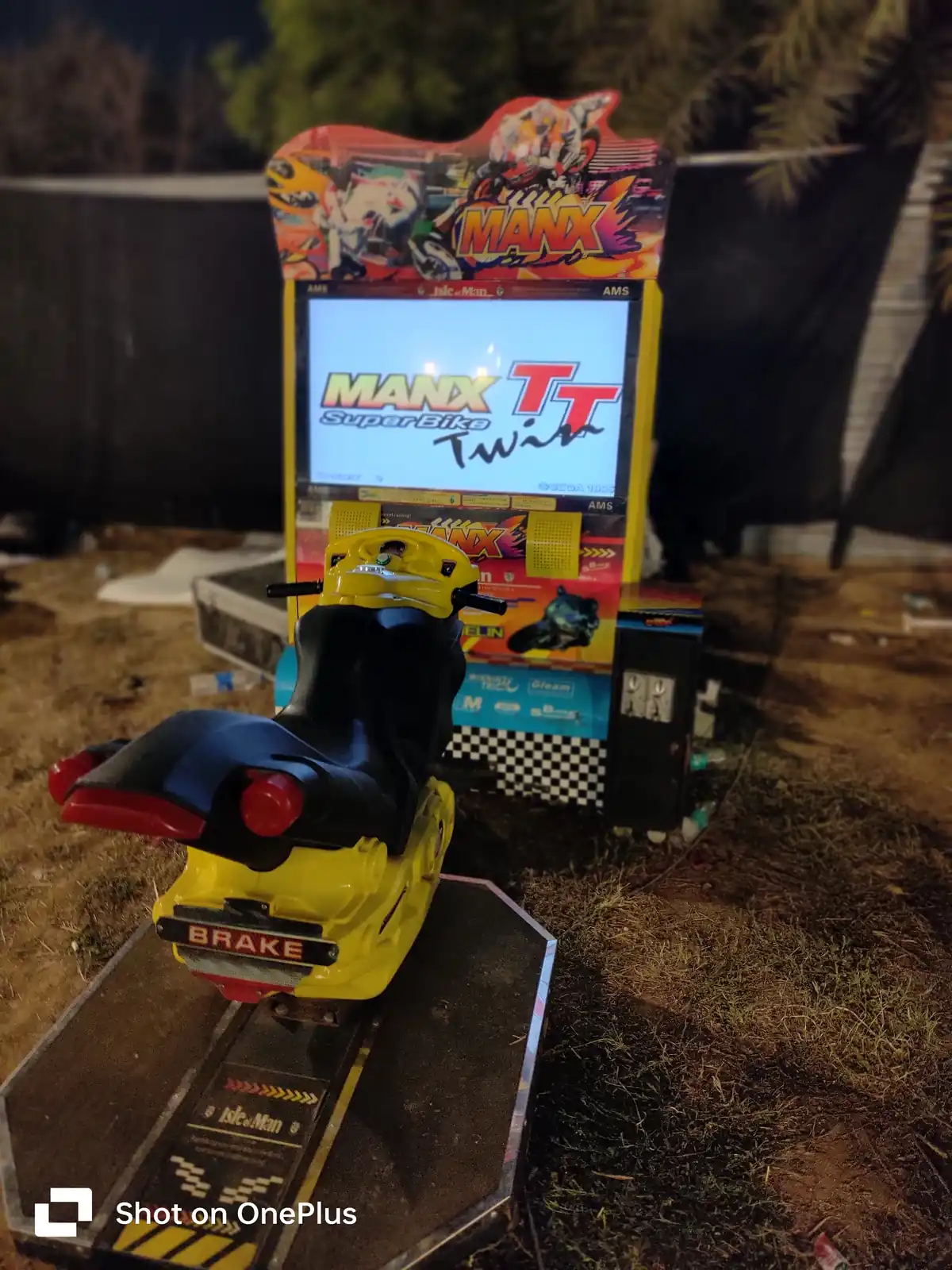 Front view of a bike racing arcade game station in Jaipur