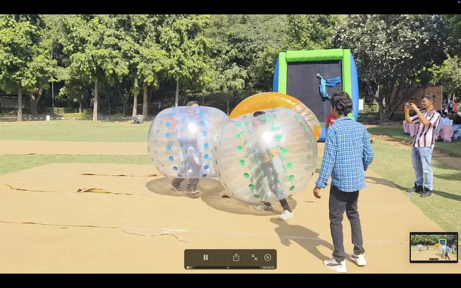 Guests enjoying body zorbing during a Lucknow celebration