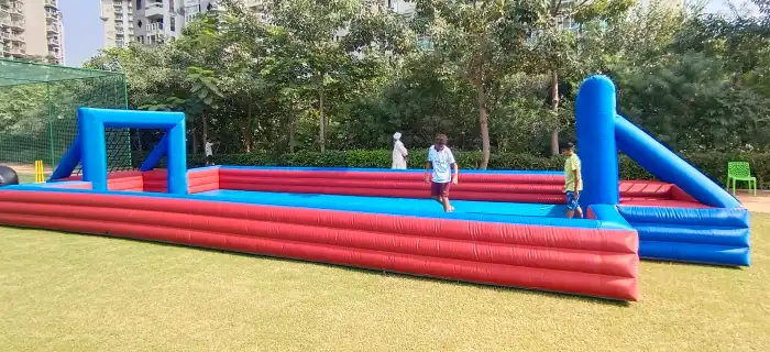 Inflatable slippery football arena prepared for play