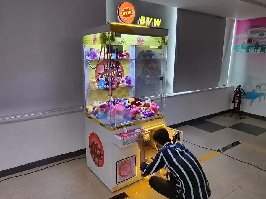 Toy claw machine filled and ready for play